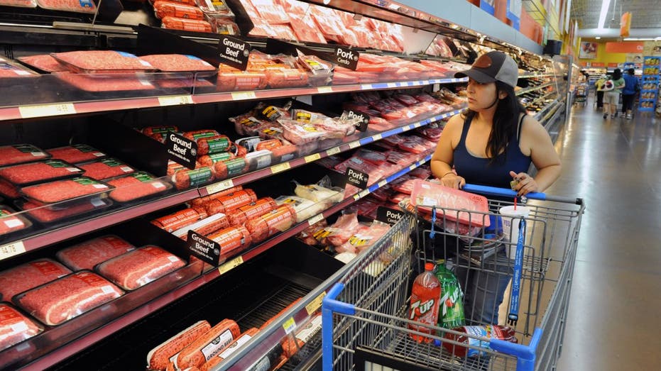 walmart customer shopping for beef